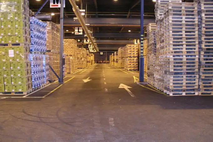 Racked warehouse interior with palletised cargo ready for distribution
